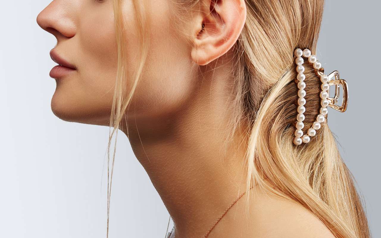 Model Wearing A Claw Clip With Long Hair