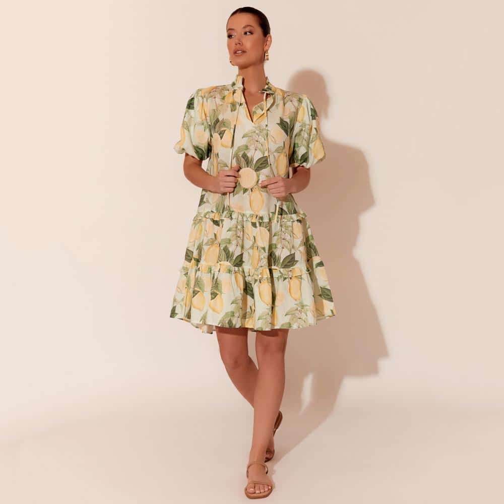      V-neck with tie     Frilled neck     Short, elasticised puff sleeves     Tiered, with frill detail     Lemon print     Easy, relaxed fit     Materials: 100% Linen