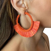 Bright Orange Bead and Raffia Statement Hoop Earrings on Model