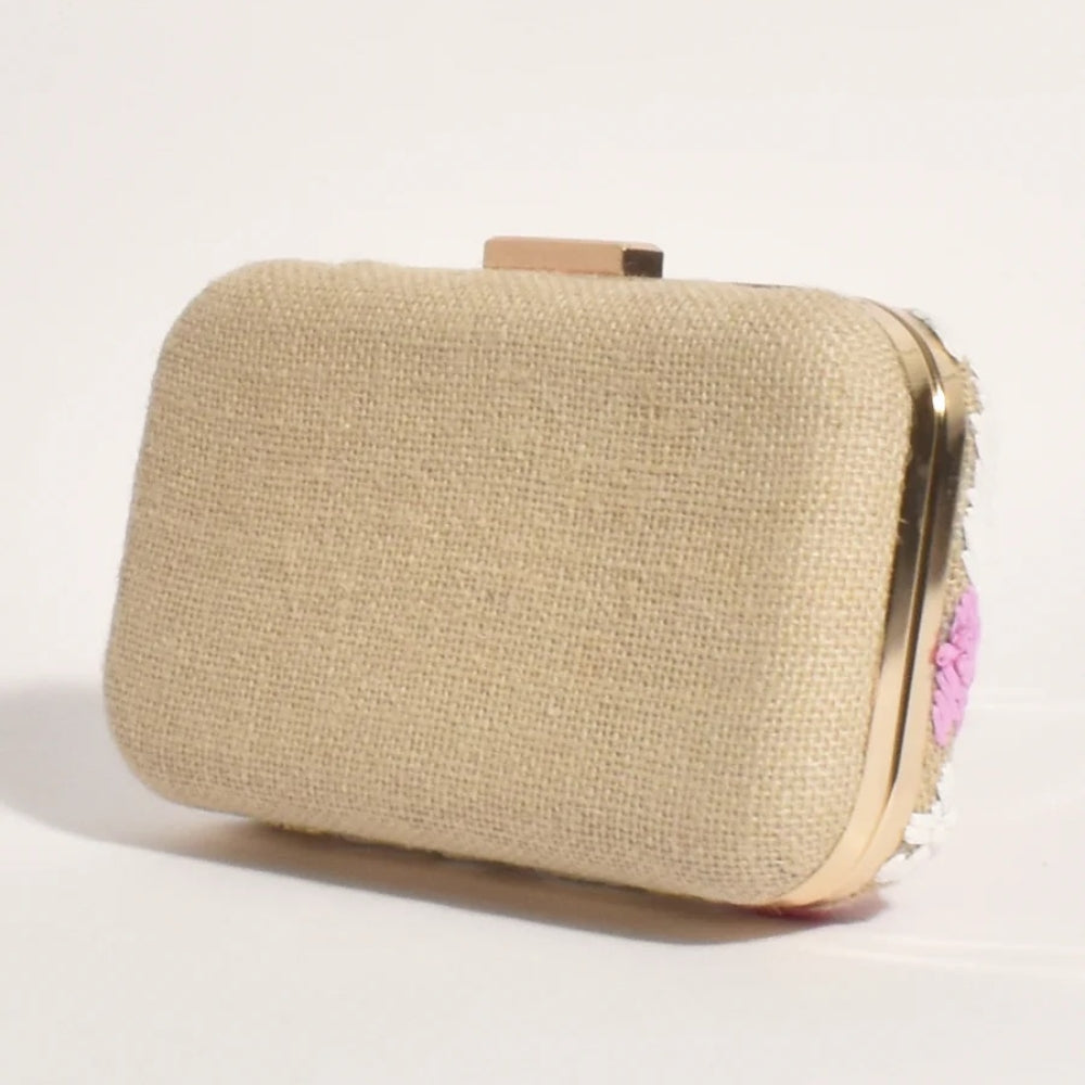 Metal clip closure Structured clutch Removable chain strap Floral stitch front detail Hessian back clutch Back VIew