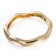 Plated metal Zig Zag Design Bangle in gold 