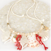 Adjustable coated cord necklace Featuring resin and gold mixed shell and coral Statement piece
