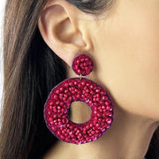 Hot Pink Beaded stud earrings Large round beaded drop on model