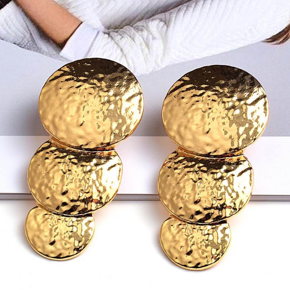 Gold Beaten metallic round disc statement earrings