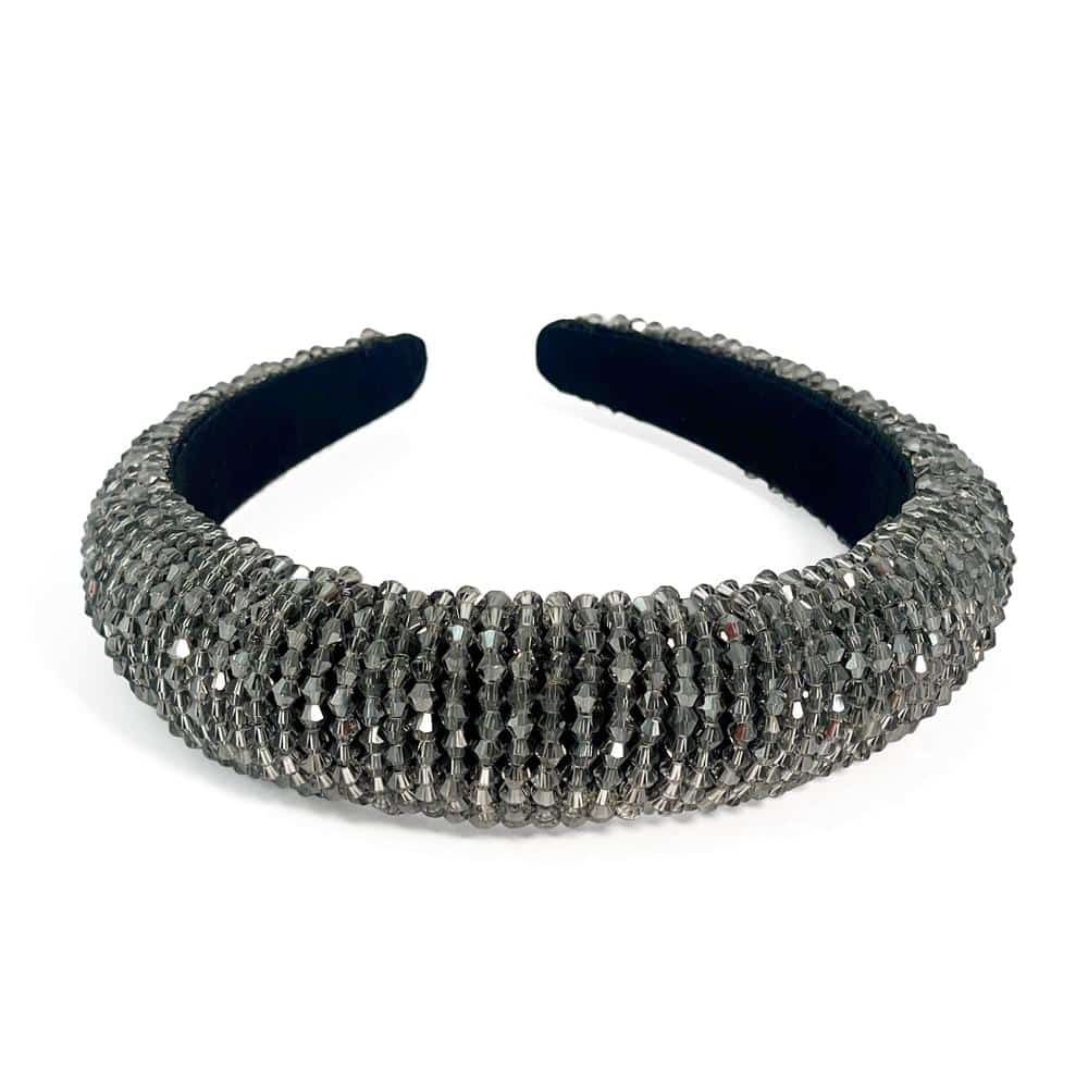 Crystal covered headband Satin padded fabric Available in champagne, steel and white Width 3.5 cm, Height 1.5 cm in Steel