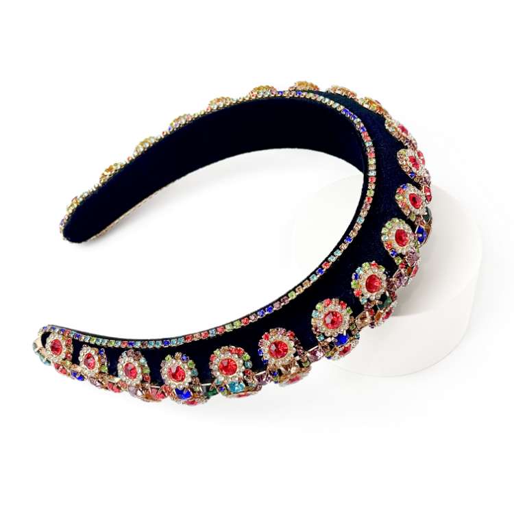 Black velvet padded headband Richly embellished in red rhinestones and diamante