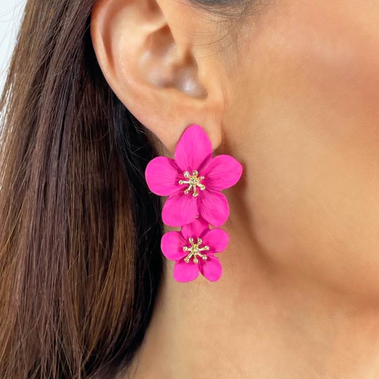 Close up on ear of Model wearing Painted Alloy Pink Flower Statement Earrings with Gold Centres