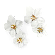 White double bloom flower drop statement earrings with gold centre