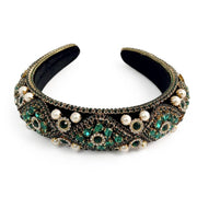 Black velvet padded headband Bejeweled in rhinestones and diamante set in gold alloy Accented with faux pearls
