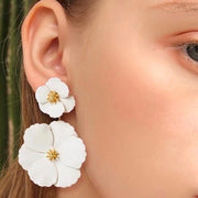 Blush colour small flower drop into large flower painted alloy earrings with gold centre