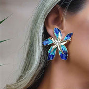 Large Gold and blue Enamel Statment Flower Earrings on Model