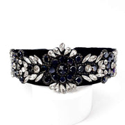 Front view of Black Velvet fabric headband Richly embellished with crystal and navy ab rhinestones and diamante with Floral design