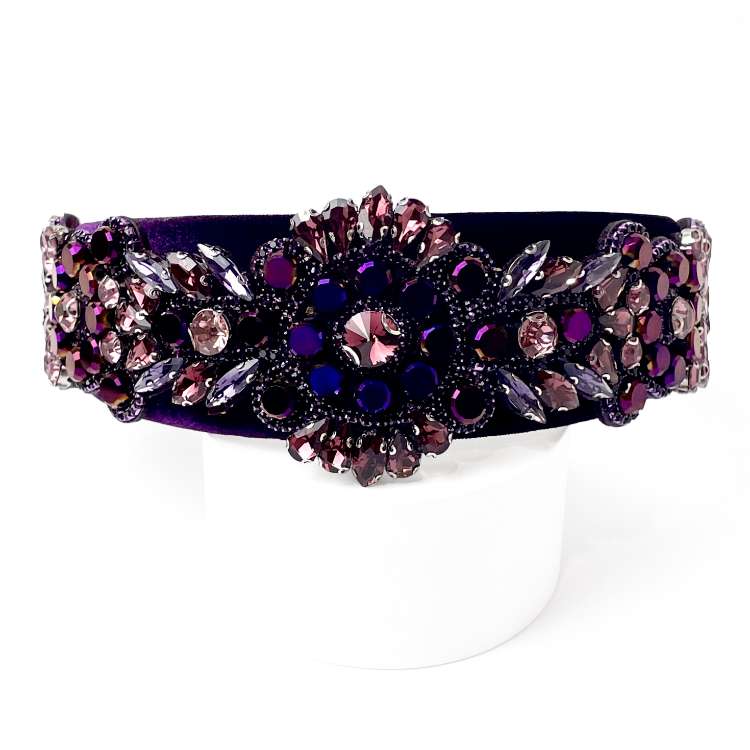 Front view of Velvet fabric headband Richly embellished with purple ab rhinestones and diamante with Floral design
