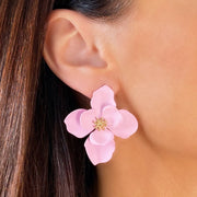 Large Pink Bloom Earrings with gold colour centre on model