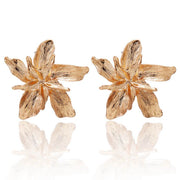 Gold textured alloy flower stud statement earrings