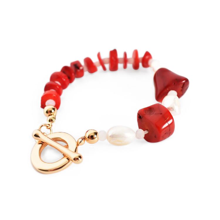 Stretch bracelet Coral tone glass stones and pearl Loop and toggle closure