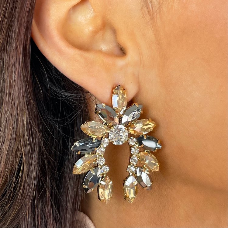 Close up of model wearing Large Amber coloured Diamante and Rhinestone Half Circle Statement Earrings