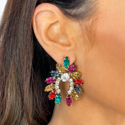 Close up of model wearing Large Multi coloured Diamante and Rhinestone Half Circle Statement Earrings