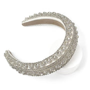White fabric padded headband  Heavily embellished in diamante and rhinestones